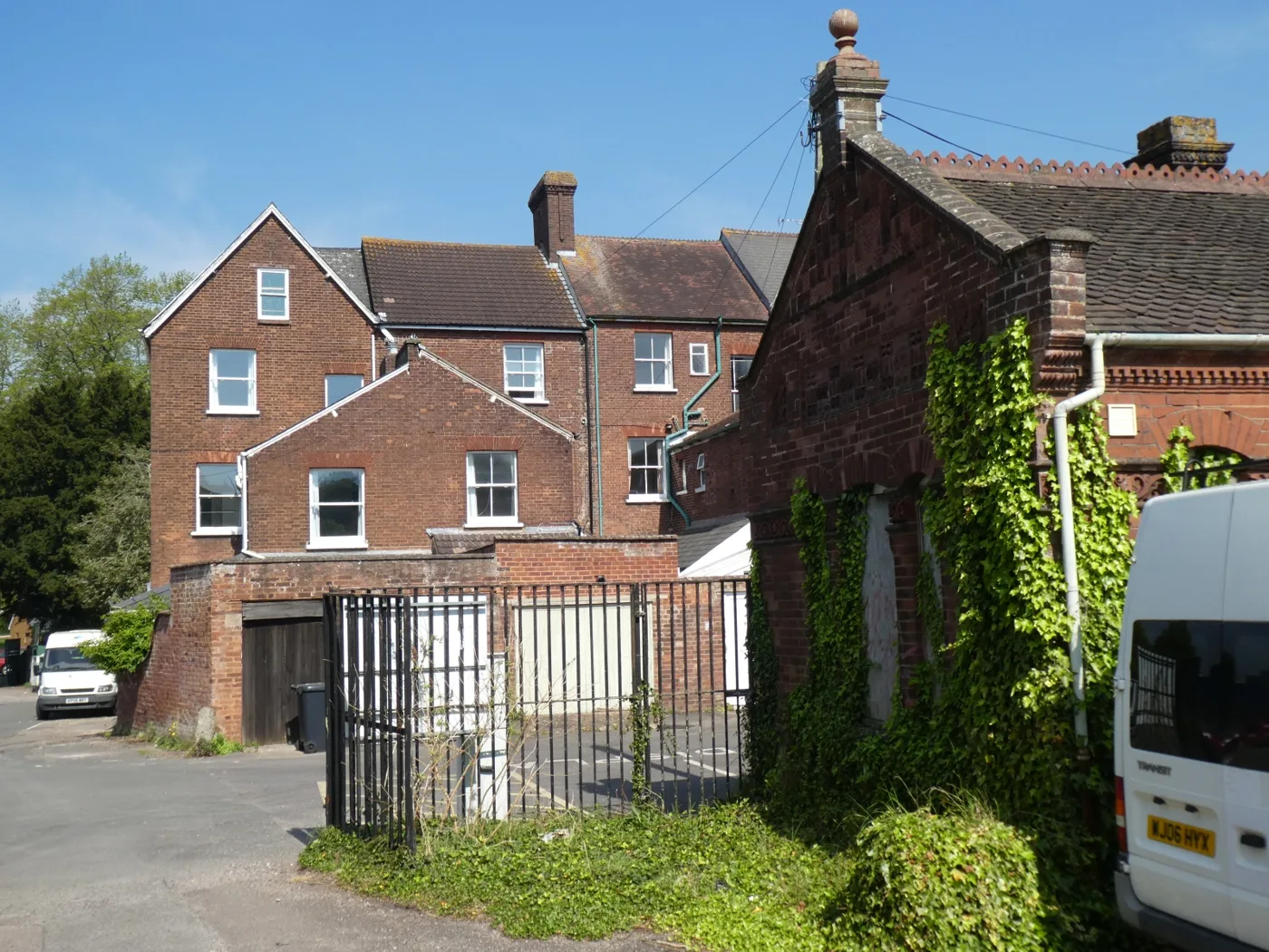 Brick building on the old Clifton Hill brickworks land, behind houses on Clifton Hill, Exeter. The picture does not show the cleared sports centre site.